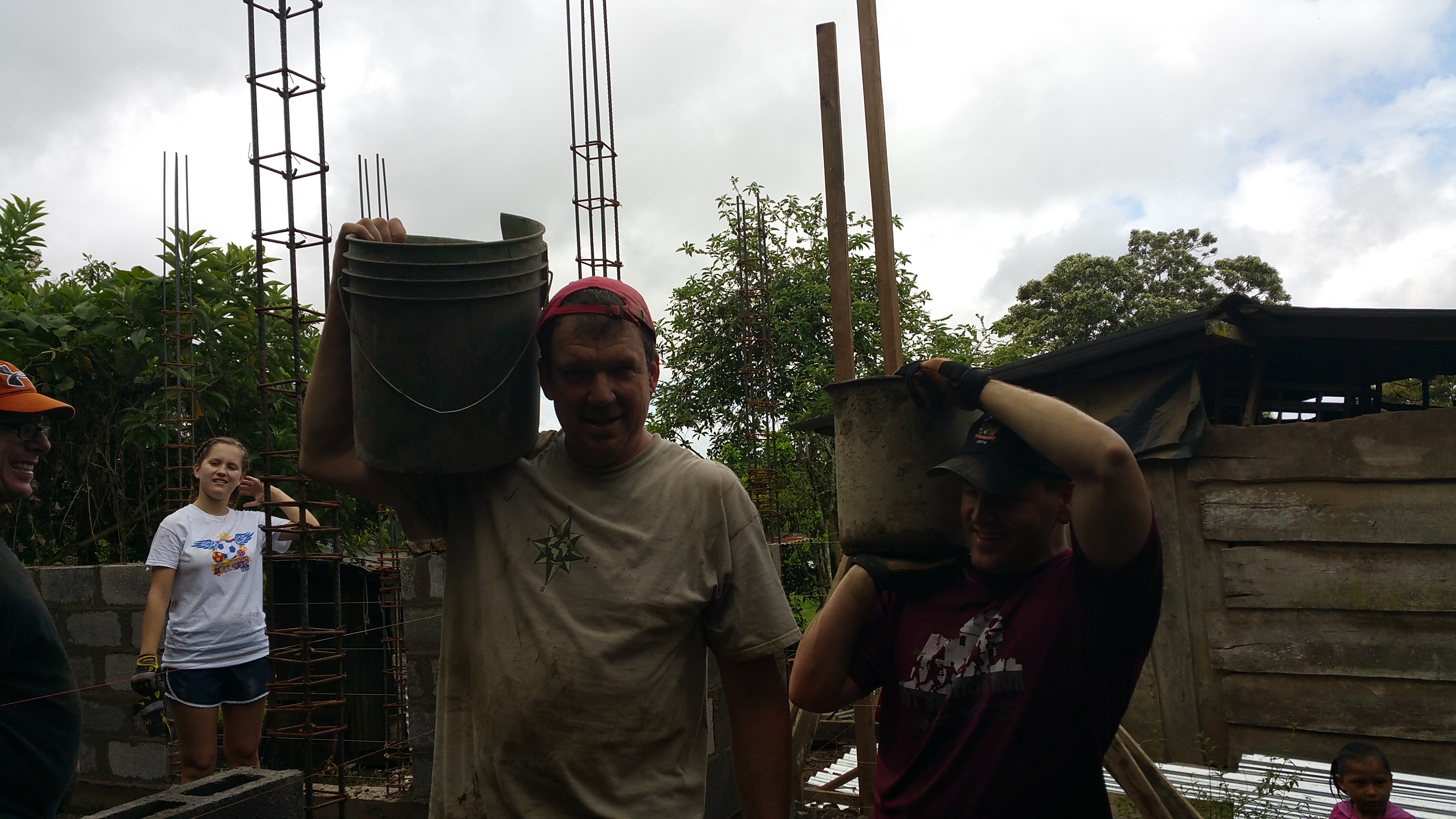Buckets of concrete were hand carried up the hill to the build sites.