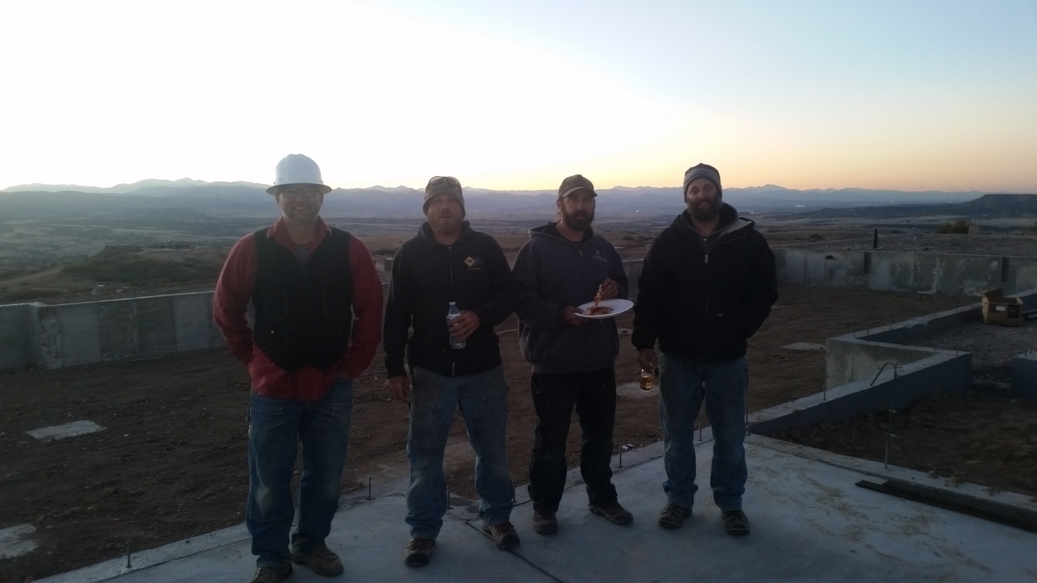 The crew arrives on site during a foggy morning.