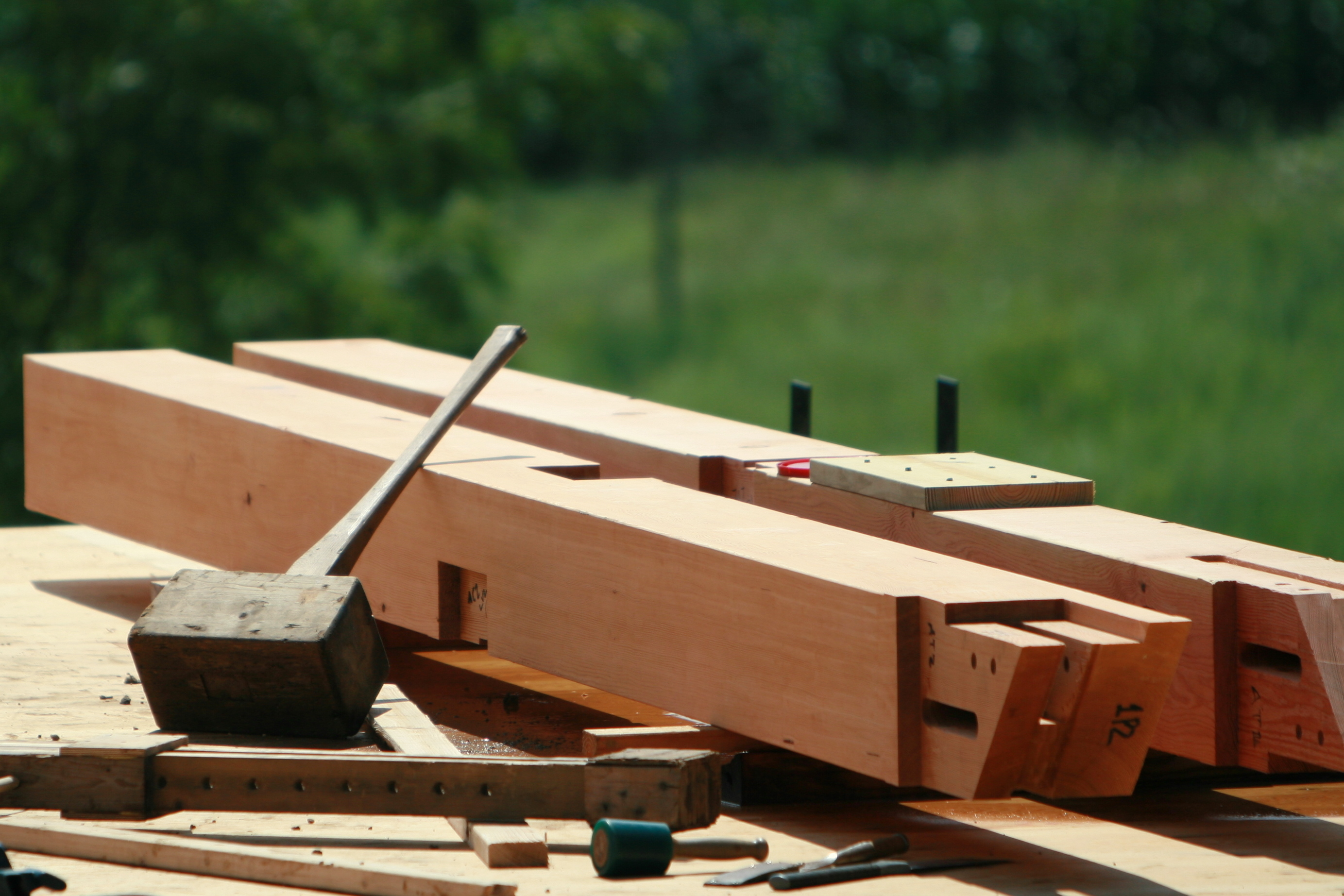 Our Beetle, the giant wooden mallet that is a vital timberframing tool, was last seen in the village of Honeoye Falls, NY taking a break in the sun.