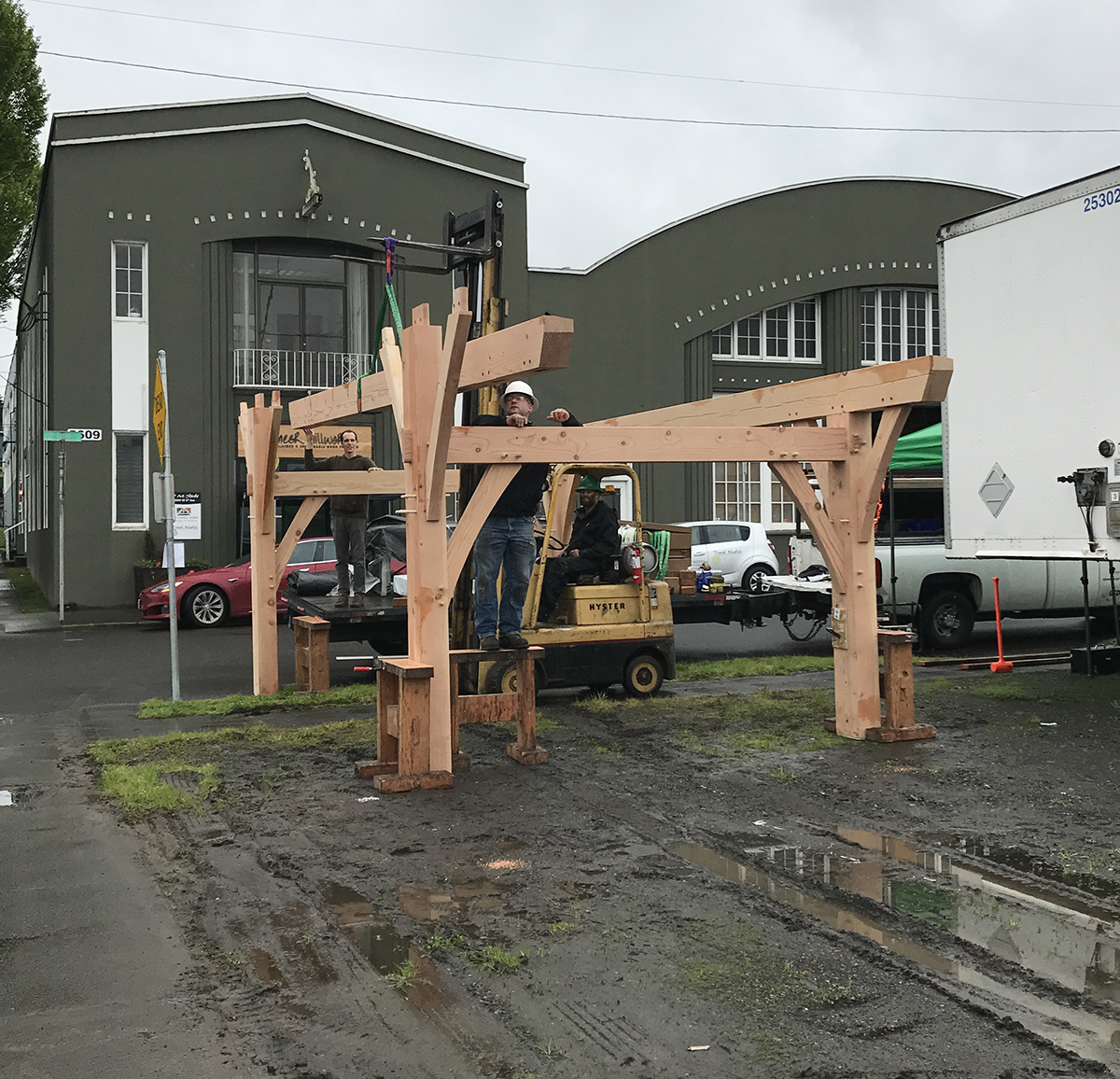 Quinn, Darren, and Mike finish  up the frame.