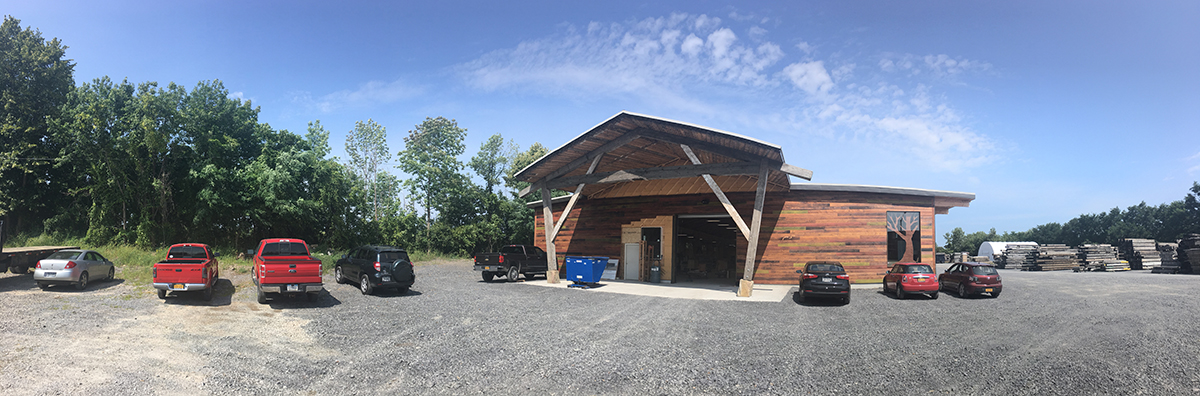 We’re finishing the exterior siding of the CLT building, which is Pioneer Millworks Shou Sugi Ban Color Char. It’s nice to see the woodworkers’ cars out front.