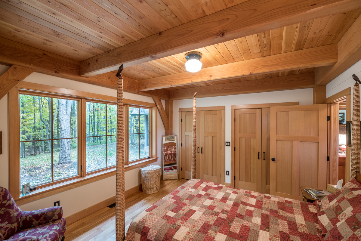 Master suite with forest views. Photo (c) Scott Hemenway.