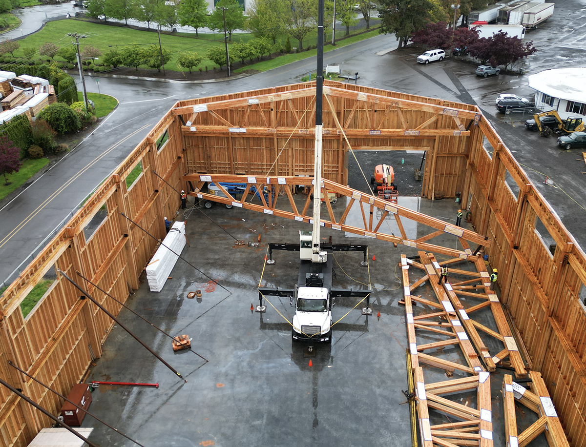 Light Commerical Glulam Trusses being rasied at New Energy Works NEWBeamery Project in McMinnville, OR