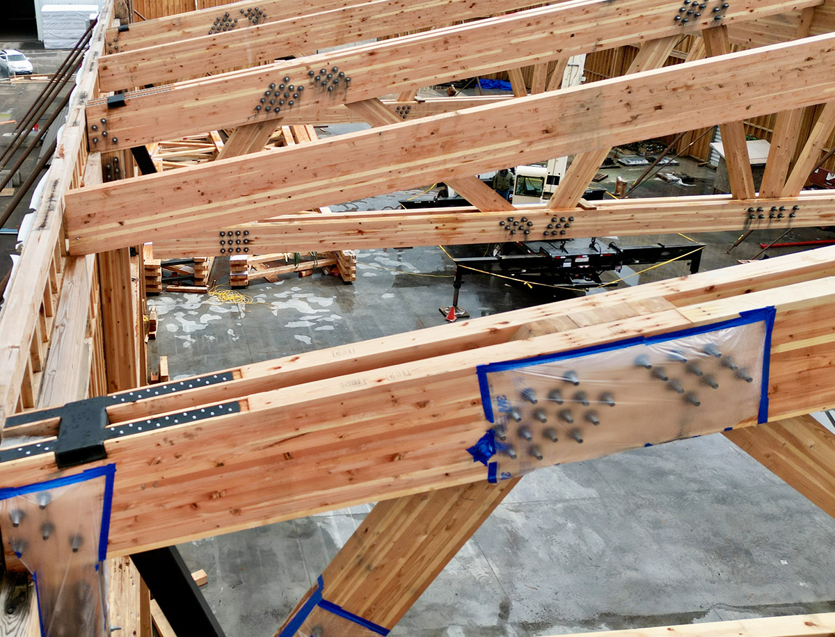 Light Commerical Glulam Trusses being rasied at New Energy Works NEWBeamery Project in McMinnville, OR
