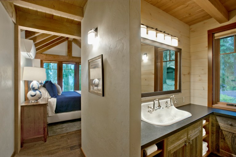 Carful planning within the smaller footprint still allows for a master suite. Photo (c) Loren Nelson Photography.