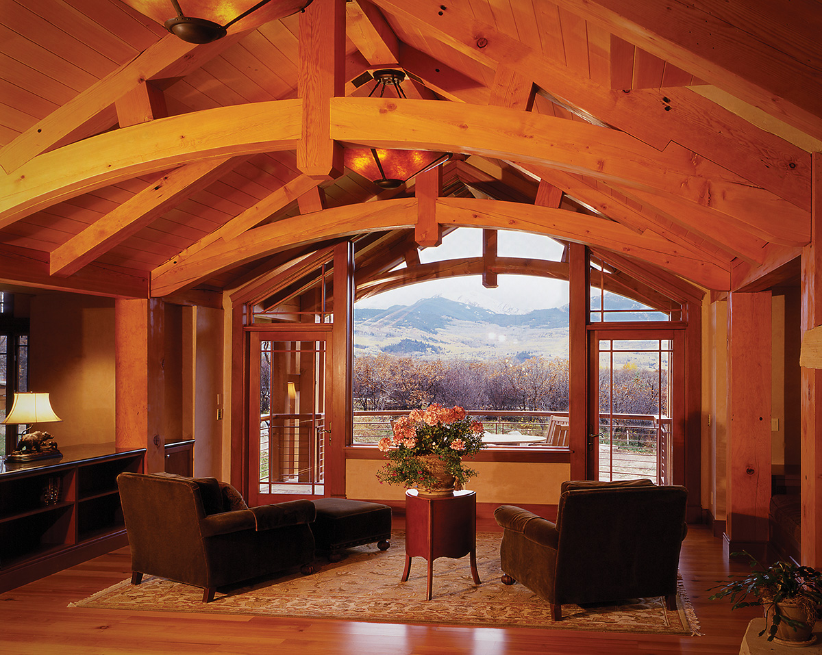 Classic oiled Douglas fir timbers in this Colorado mountain timber frame home.