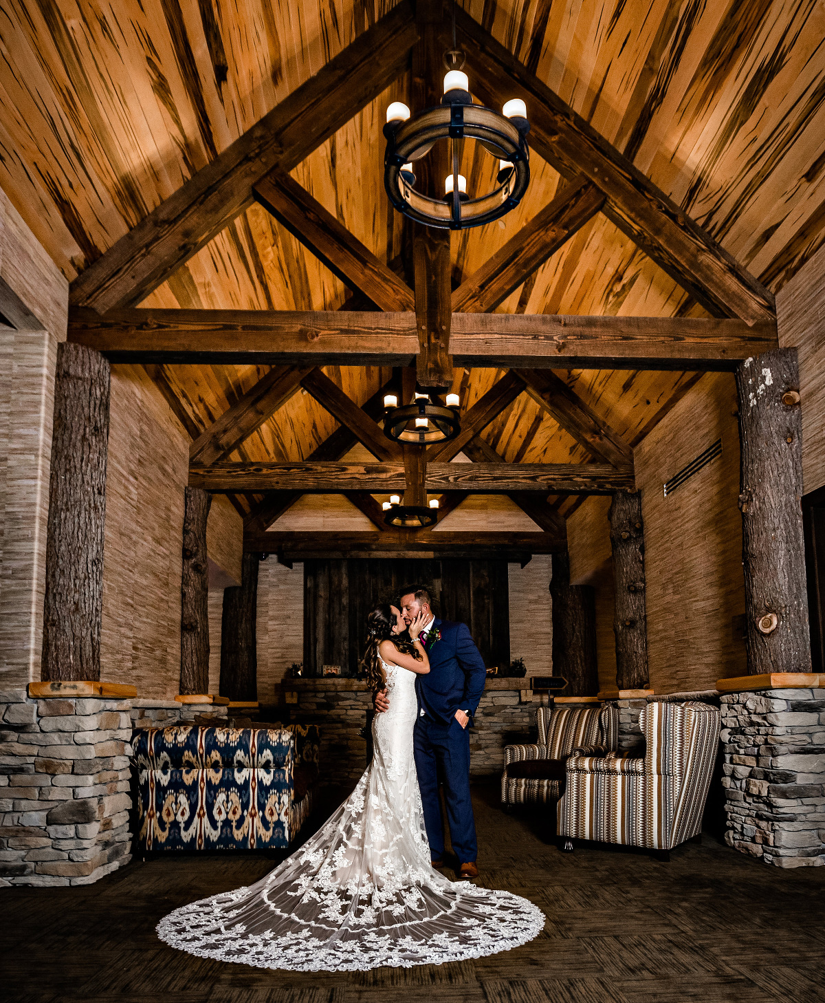 Timber frame bents frame the more intimate spaces of Tailwater Lodge’s, The Barn. Photo c Cylinda B Photography.