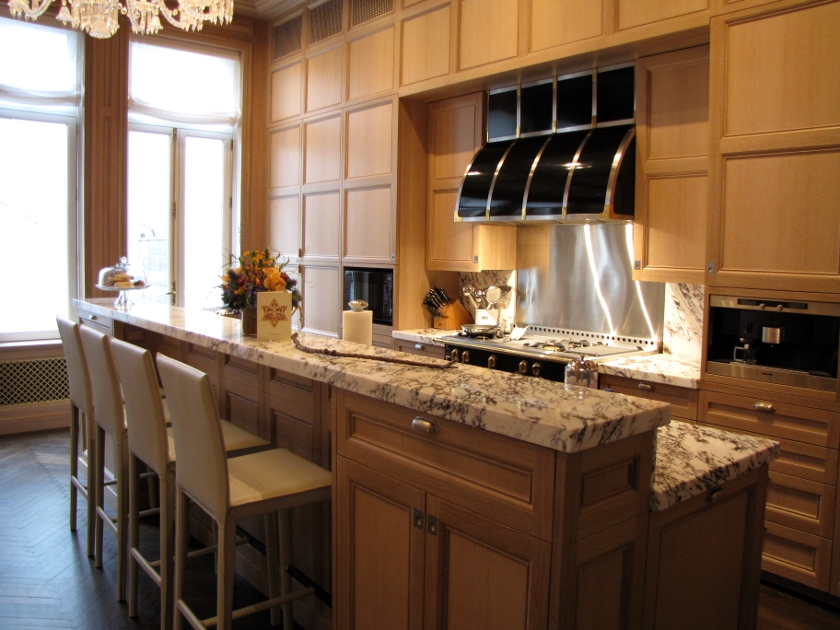 Carrying the oak paneling proportions throughout the kitchen and island was key for this NYC home.