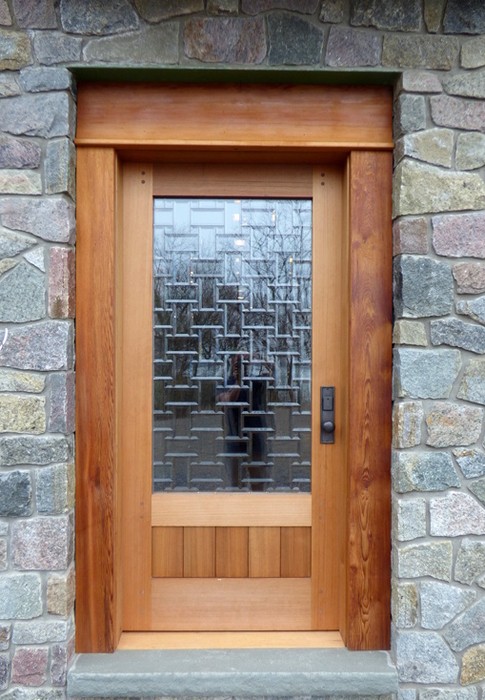 A custom glass mosaic was fitted to a side door for Ross and Anna-Marie’s home on Lake Erie in New York.
