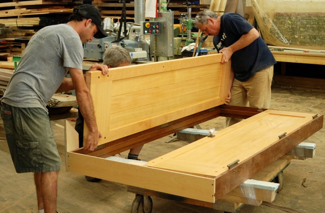 Pre-assembly of a door unit in preparation for shipping.