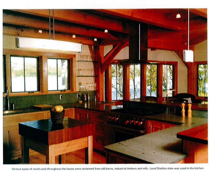 Various types of wood used throughout the house were reclaimed from old barns, industrial timbers and mills. Local Sheldon Slate was used in the kitchen.