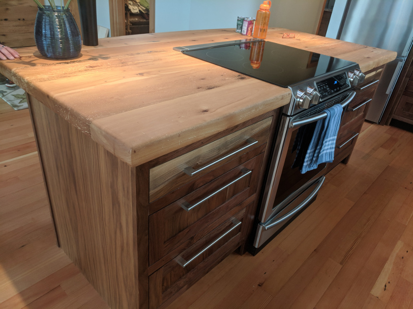 Detailed execution of all pieces and parts make up this Jewel, including custom Walnut cabinetry and island.