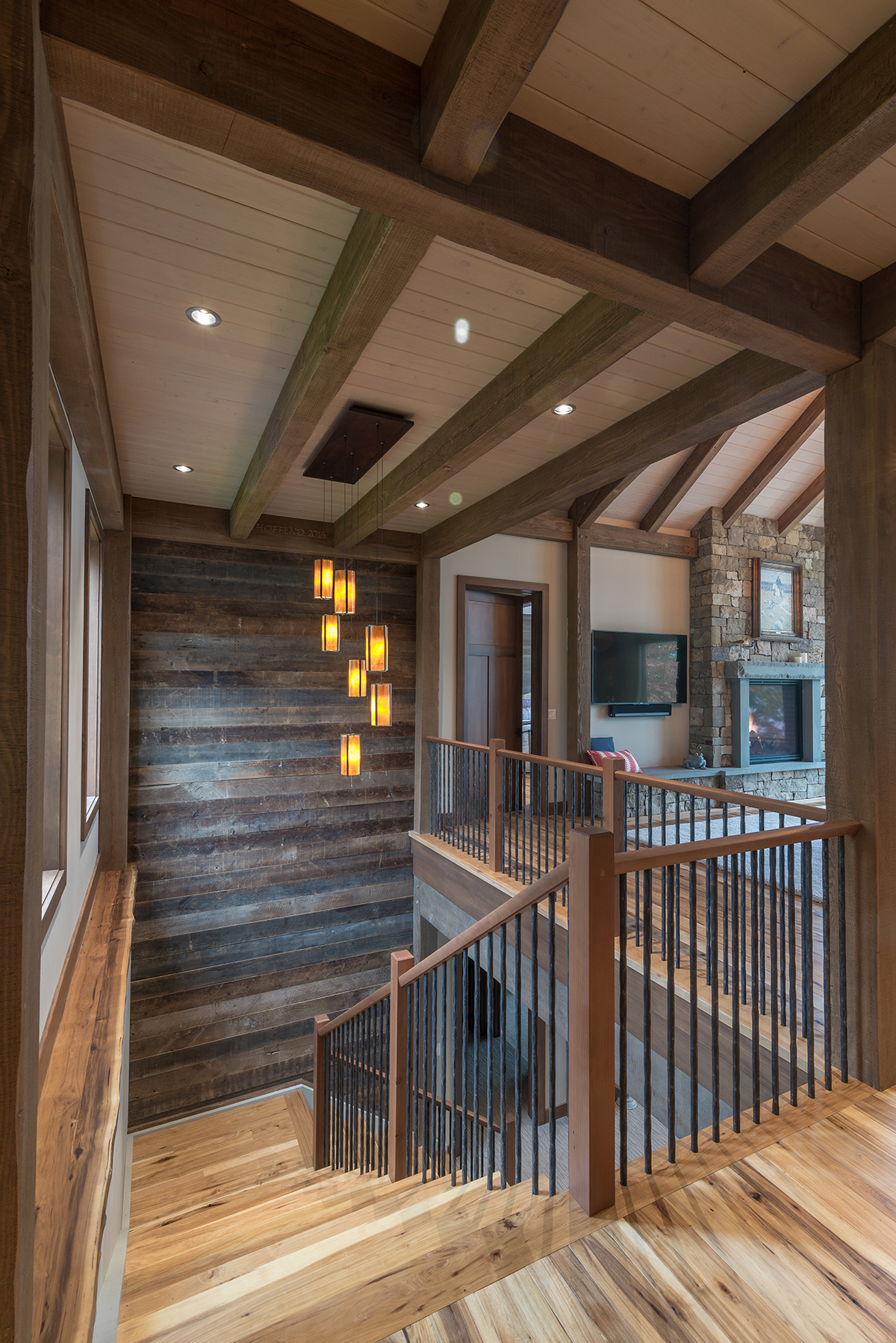 “Stairs are also directional. In this lake home, the stair leads to the lake level and as it turns it delivers you heading towards the lake, suggesting a flow from inside to outside,” shared Ty. Photo by Scott Hemenway.