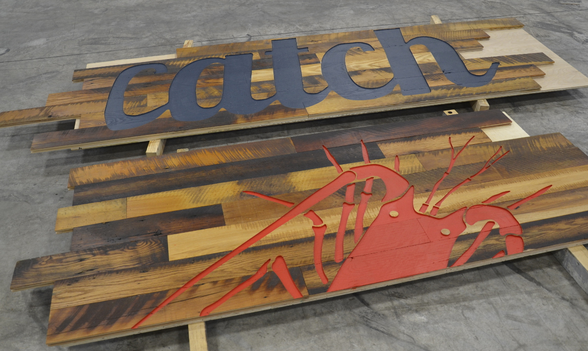Reclaimed hardwoods from Pioneer Millworks were pre-panelized and then carved on Thelma (the NEWwoodworks CNC) for the Florida eatery.