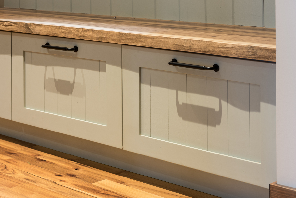 Site-harvested hickory was salvaged and used for bench tops and the kitchen island top.