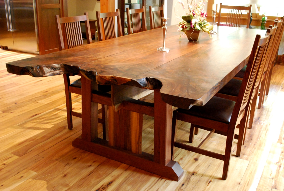 The root burl of a large walnut tree was carefully maintained to create a live-edge end on this farmhouse table.