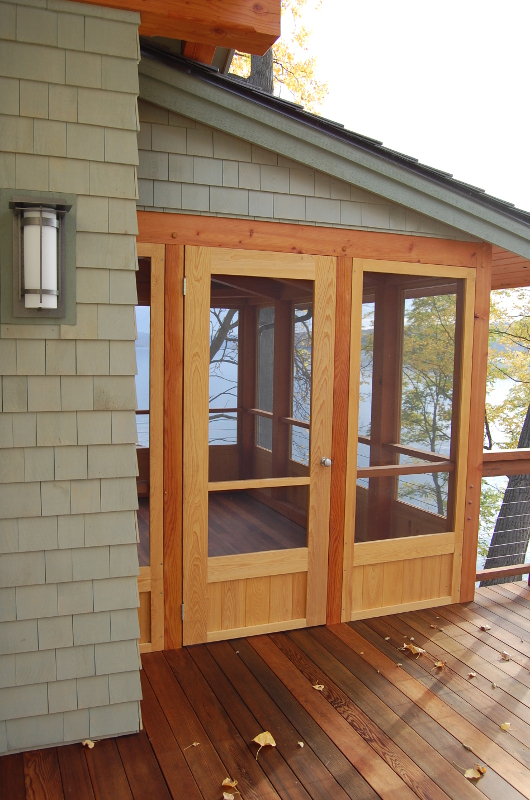 The master bedroom screen porch connects with the upper-level guest balcony, or ‘star deck’ each blurring the line between inside and out. We’re told the star deck is one of the family’s favorite spaces for nighttime gatherings.