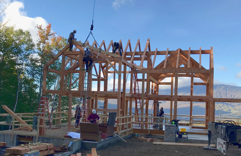 Mike, Pete, Rick, and Matt raising the frame for Julie and Hank’s home in Vermont.