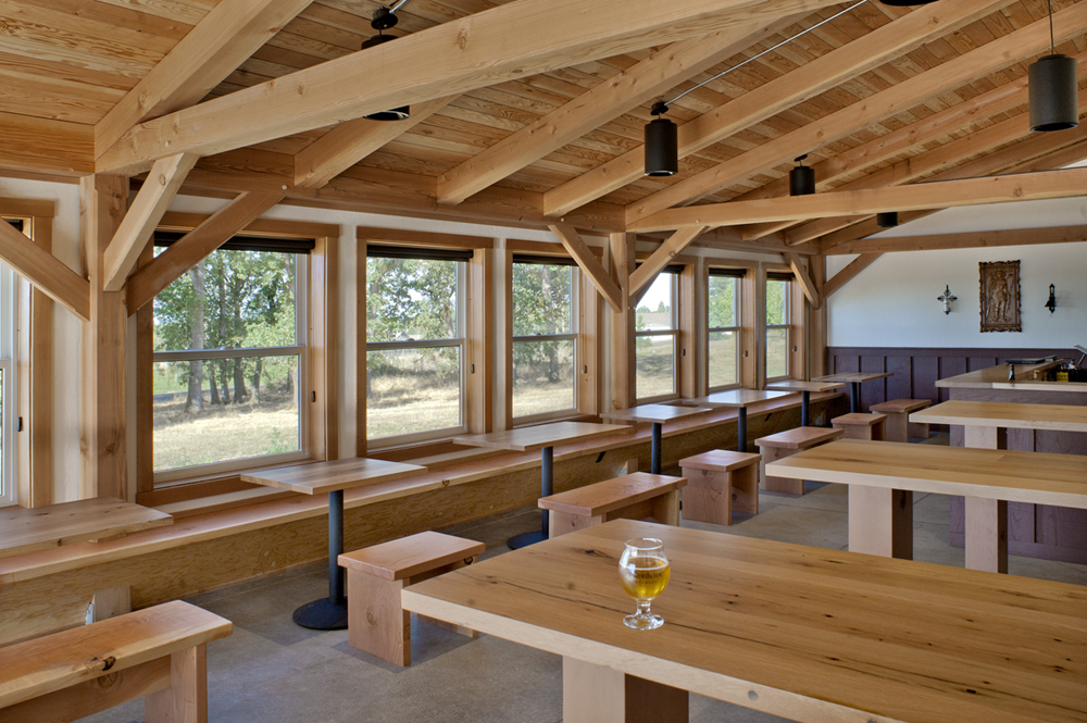 The frame had a net total of 11,400 board feet of timber, 310+pcs, six bents (think of this as a truss, with legs), and a building footprint of 80’ long, 40’ wide, and 24’ to the ridge. The timbers themselves were sawn down at Hull Oakes mill in Monroe, and came from the monastery’s own forests.