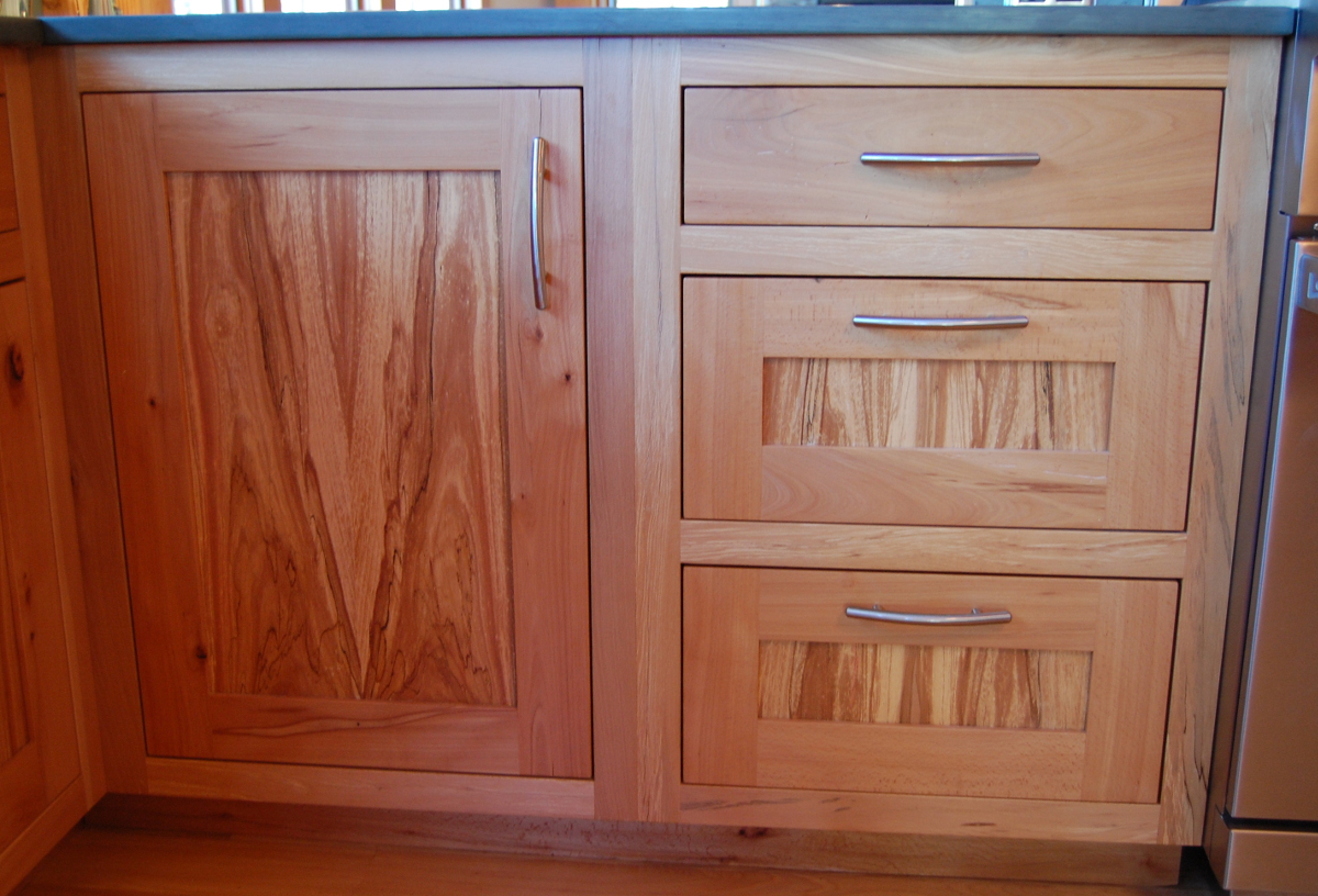 Spalting was celebrated and grain matching flows throughout all of the handcrafted cabinetry made by NEWwoodworks.
