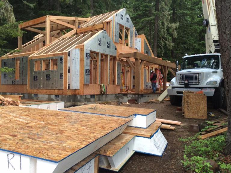 The timber frame and structural deck systems are construction of locally sourced Douglas fir and an envelope of Structural Insulated Panels (SIPs) roof system with prefabricated wall panels. Many timbers and posts in the frame were 10″x18″, a fairly robust size.