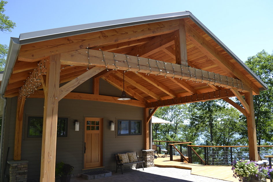 The porte cochère of Tom and Maureen’s home has become a popular gathering space during parties and large family functions.