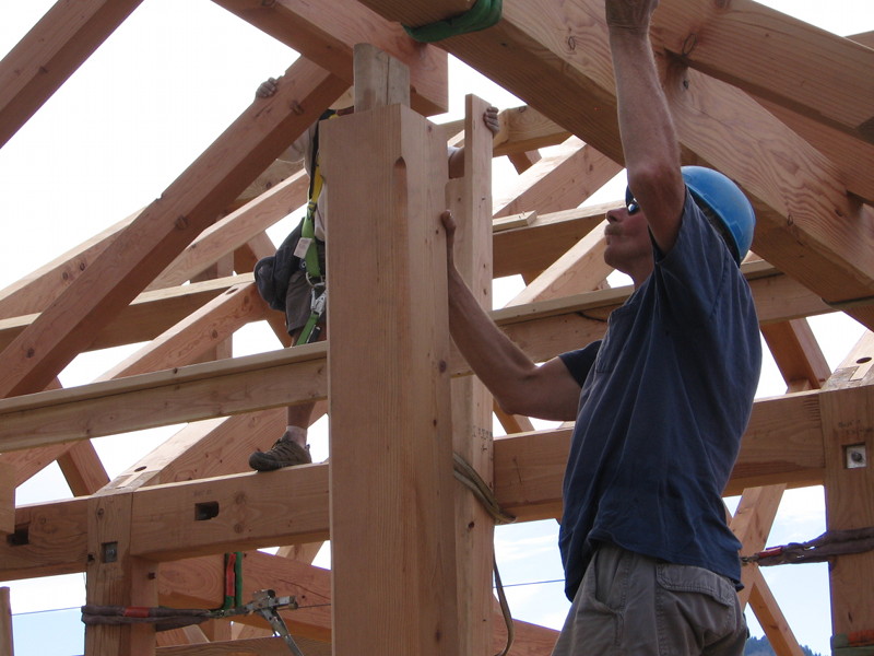 Dave guides a mortise pocket to the post tenon.