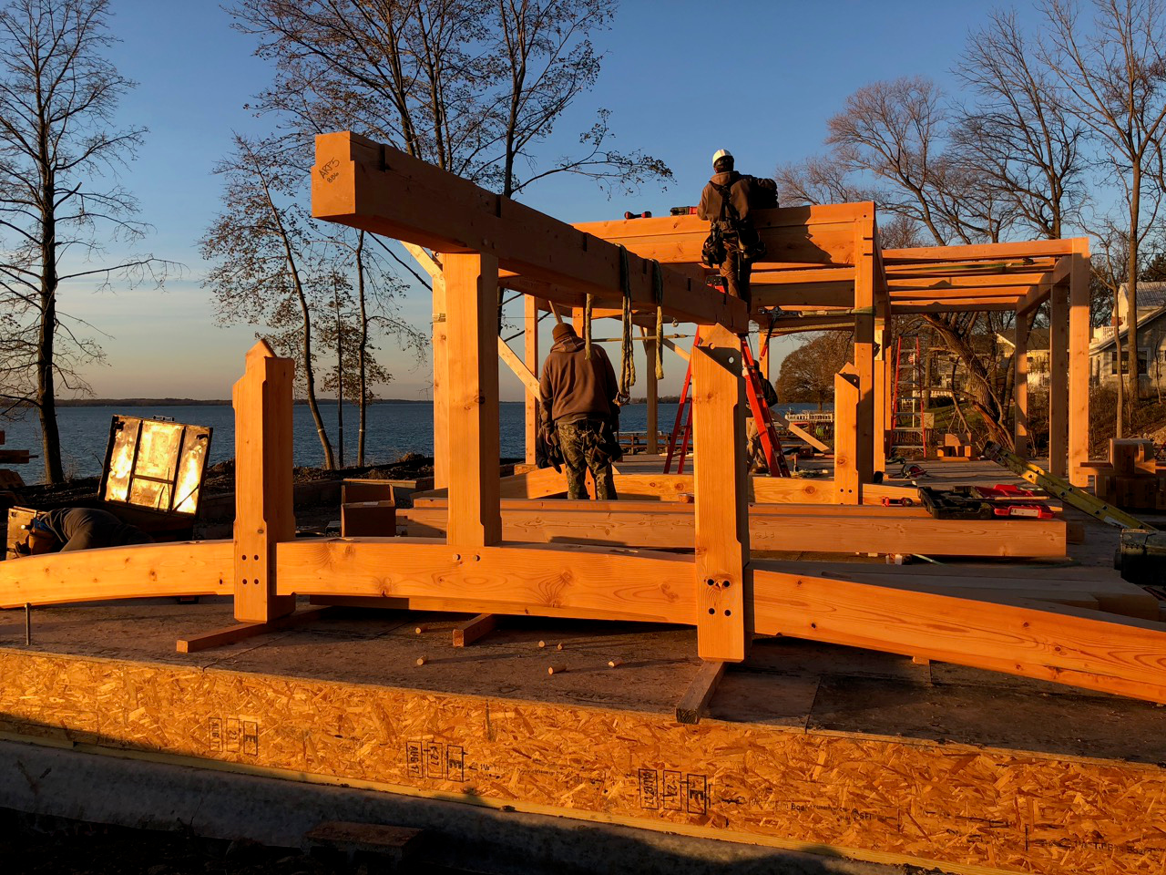 At the end of the first day, as the sun was actually setting, part of the timber frame roof system was pre-assembled, ready to go up the following morning.