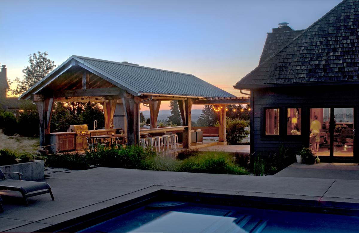 As-found industrial timbers were given new life as the frame for Daniel & Sheri’s outdoor kitchen/dining/living space.