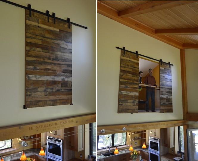 Tom and Ann’s home uses reclaimed wood flat track doors as great room wall art and a privacy barrier to their upper level office.