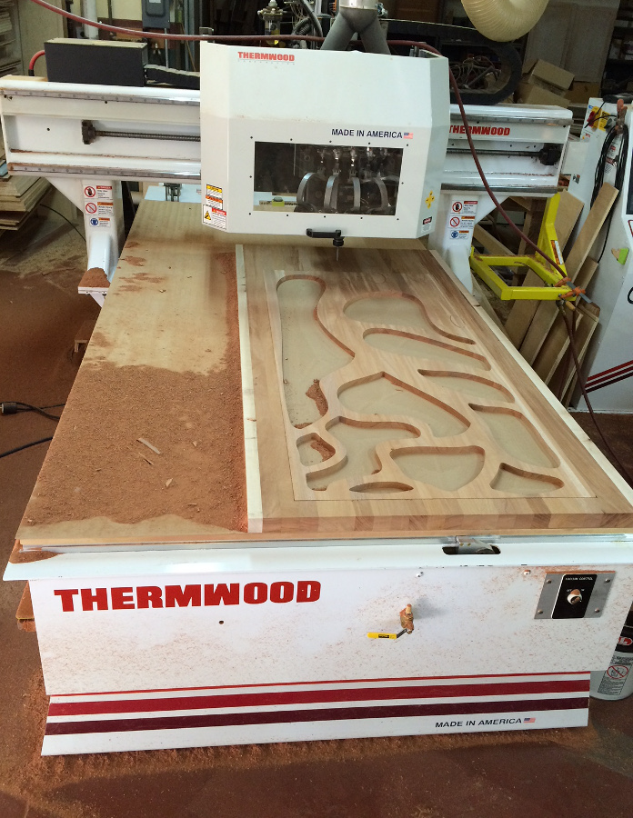 Thelma roughs out one side of the “tree door” set.