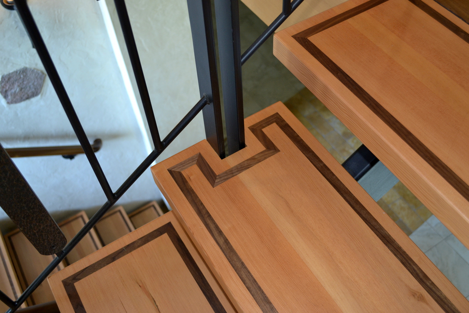 Walnut inlaid in Douglas fir and combined with metal details.