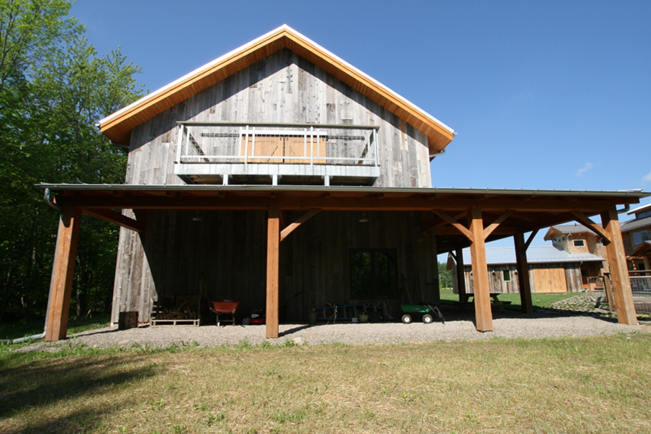 Adjacent to their family home, Dan and Beth’s party barn is perfect for gatherings, pick-up basketball, jam sessions, and of course, storage.