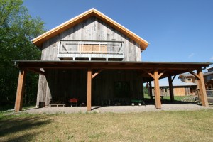 Adjacent to their family home, Dan and Beth’s party barn is perfect for gatherings, pick-up basketball, jam sessions, and of course, storage.