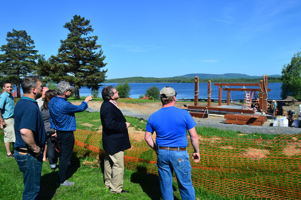 Onlookers, including the bandshell designer, Andrew Chary Architect, watched our team assemble the frame on raising day. (Image and more of the story from the Adirondack Daily Enterprise.)
