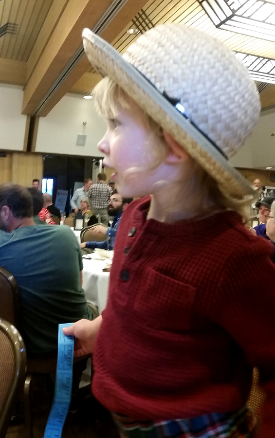 My boy Tucker was more than ready to place his bids during the auction!