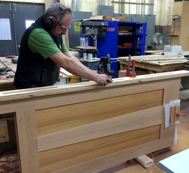 Fabricating door assembly.